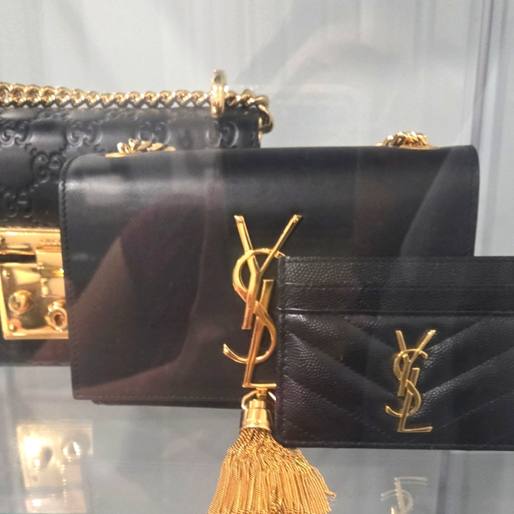 Yves Saint Laurent Black and Gold Clutch with Iconic YSL Logo
